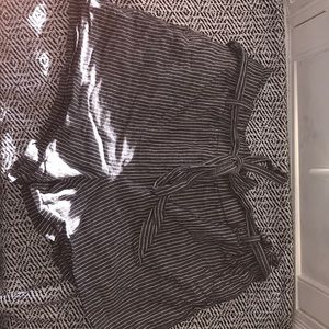 grey and white striped shorts.